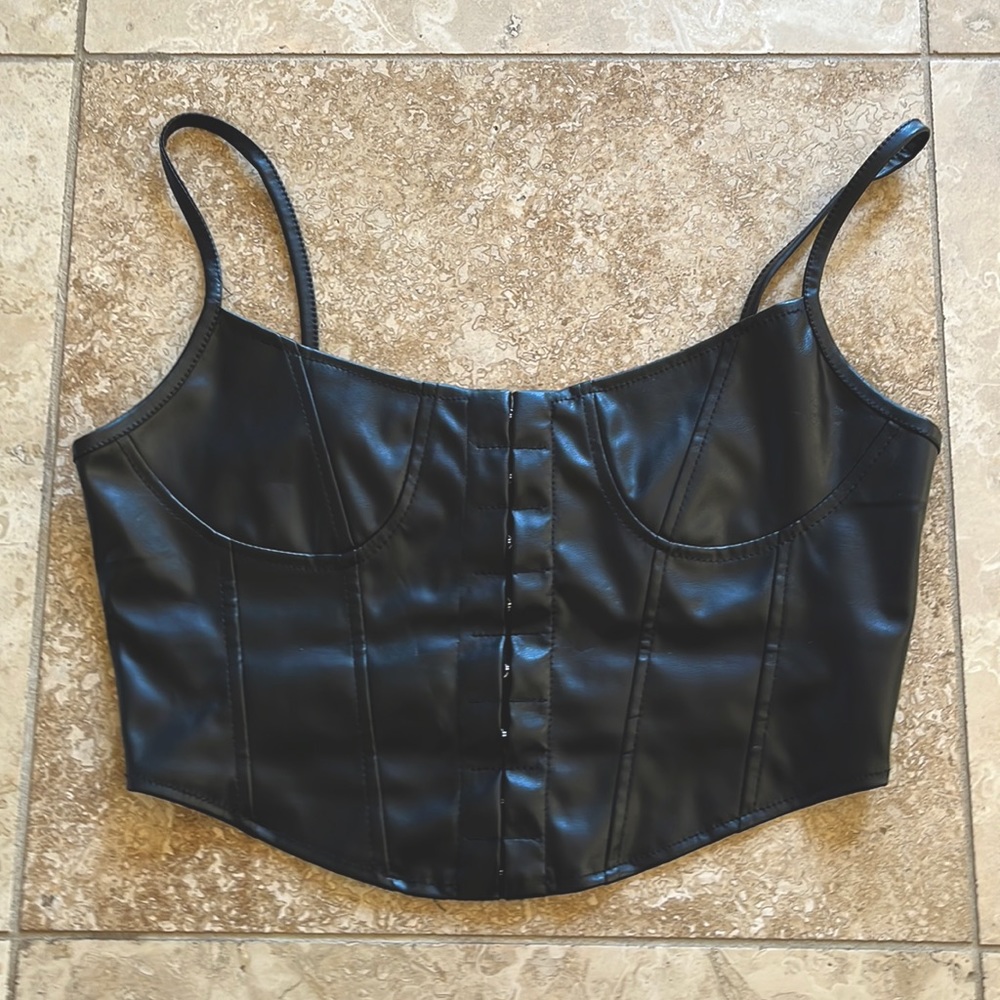 Black bustier perfect for concerts, night out on the town, or on a motorcycle.